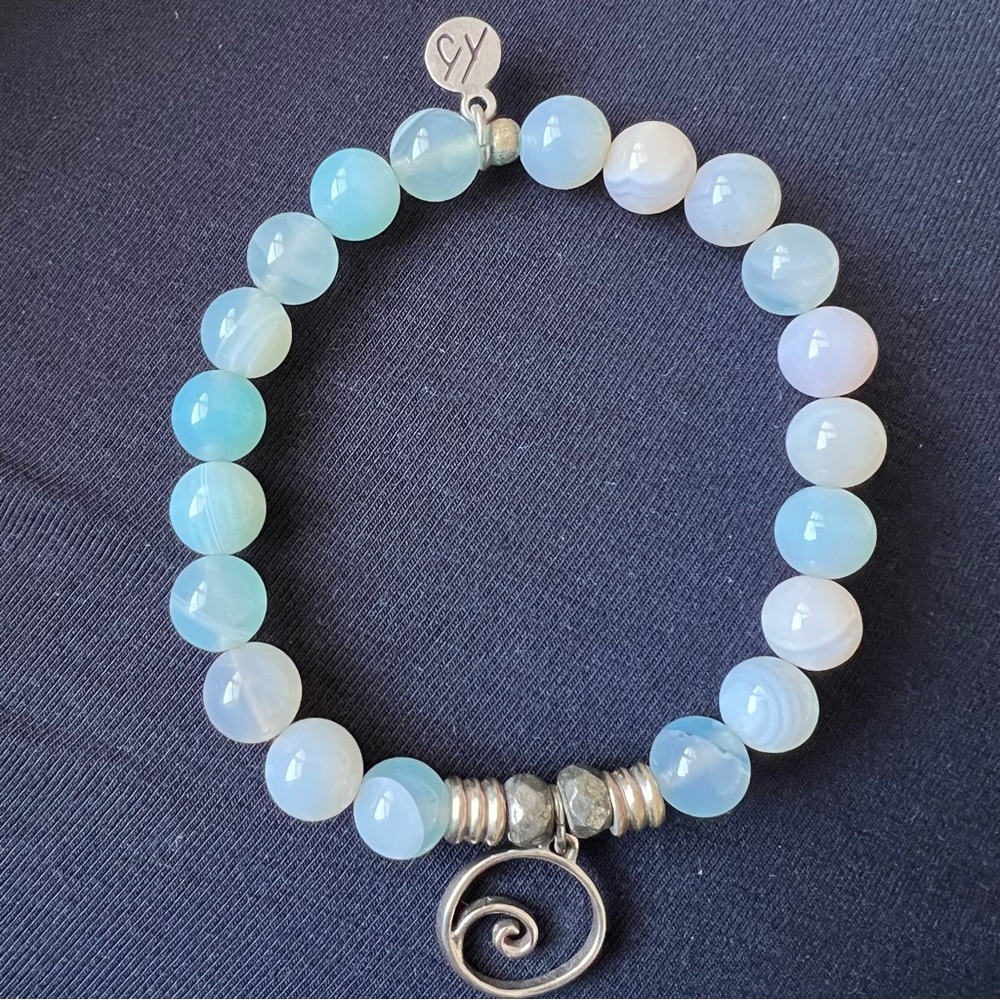 T Jazelle blue aquamarine bracelet with wave charm
